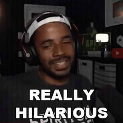 Man With Headphones and Headband Making Funny Face