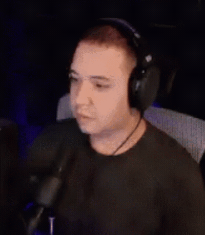 Man With Headphones And Microphone At Computer GIF