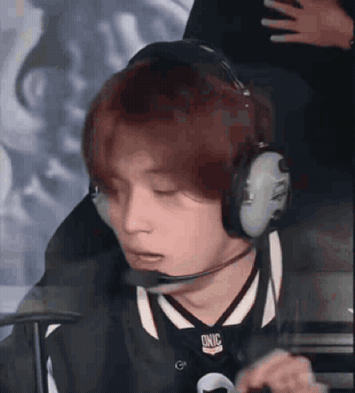 Man With Headphones And Microphone Eyes Closed GIF