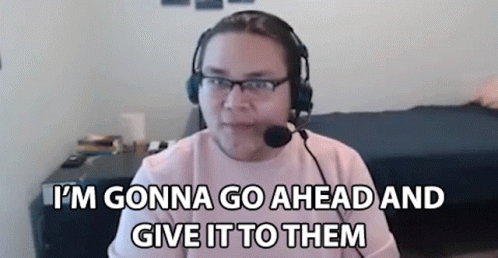 Man With Headphones And Microphone Sitting At Computer GIF