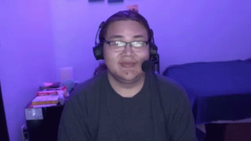 Man With Headphones And Microphone Smiling GIF