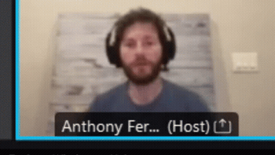 Man With Headphones And Name Tag Anthony Fer GIF