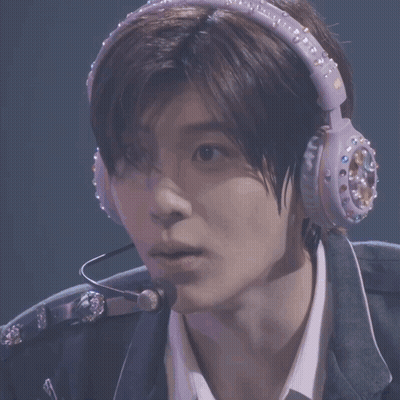 Man With Headphones And NCT Badge GIF
