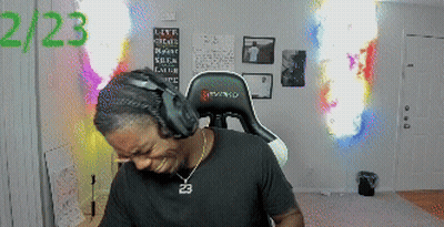 Man With Headphones And Number 23 Necklace GIF