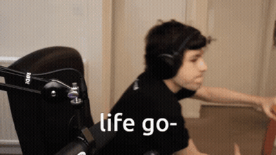 Man With Headphones And Rode Mic Saying Life Go GIF