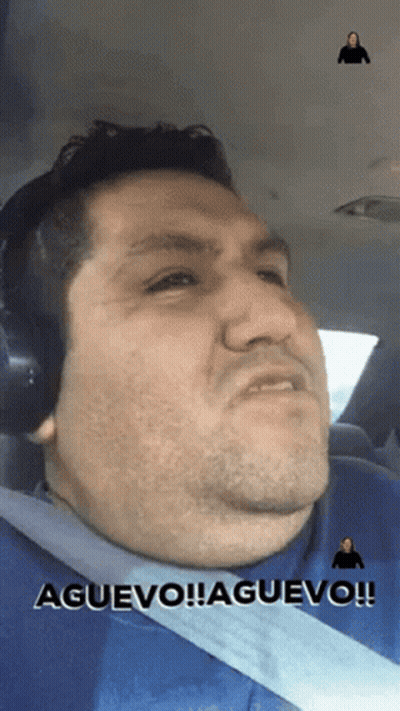 Man With Headphones And Seat Belt Says Aguevo Aguevo GIF