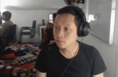 Man With Headphones And Serious Look GIF