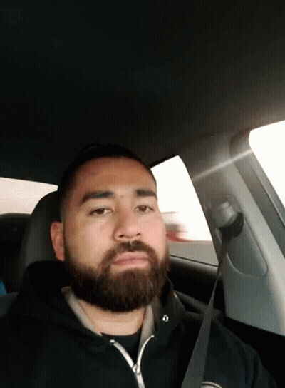 Man With Headphones And Shirt Saying Okay GIF
