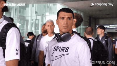 Man With Headphones And Spurs Shirt GIF