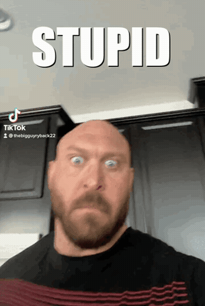 Man With Headphones And Tie Looking At Camera GIF