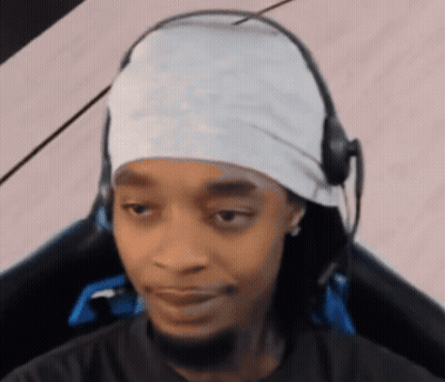 Man With Headphones And White Headband Sitting GIF