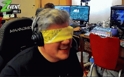 Man With Headphones And Yellow Bandana In Front Of Z Event Logo GIF