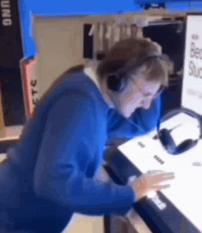 Man With Headphones At Computer GIF