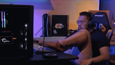 Man With Headphones At G.Skill Computer GIF