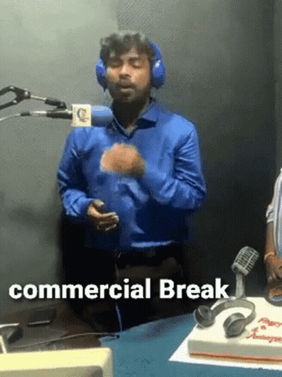 Man With Headphones At Microphone Commercial Break GIF