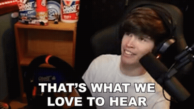 Man With Headphones At Microphone Saying What We Love GIF