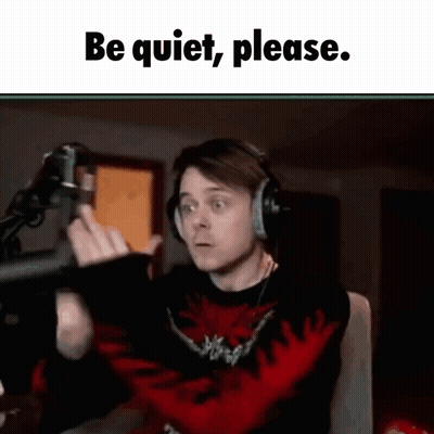Man With Headphones At Microphone Says Be Quiet Please GIF