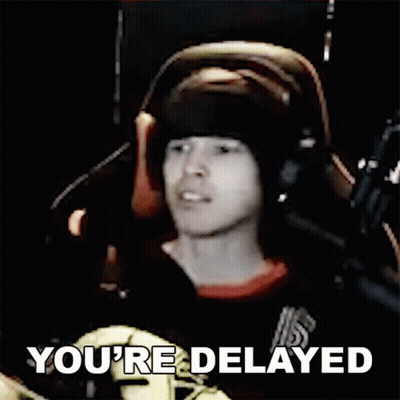 Man With Headphones At Microphone Says You're Delayed GIF
