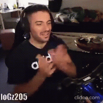 Man With Headphones Clapping While Gaming GIF