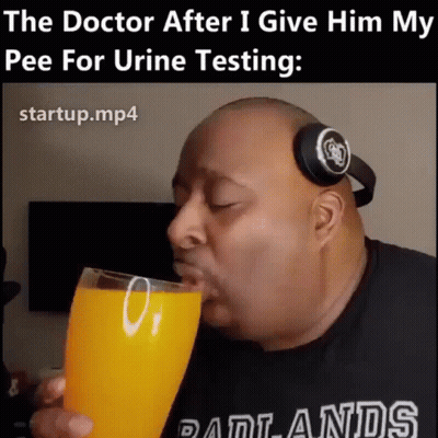 Man With Headphones Drinking Orange Juice