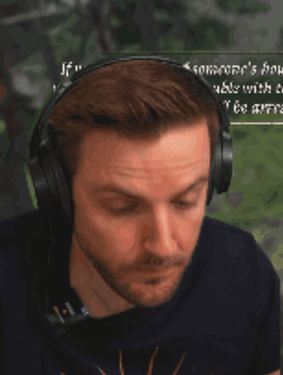 Man With Headphones Eating Hamburger & Saying And Someone's Problem GIF