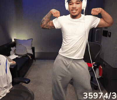 Man With Headphones Flexing 359743 GIF