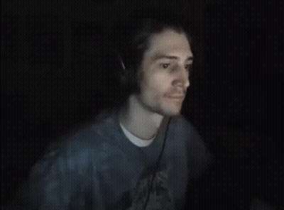 Man With Headphones Funny Face In Dark Room GIF