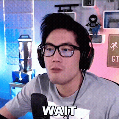 Man With Headphones, Glasses, And Wait Shirt GIF