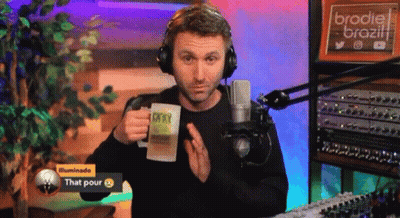 Man With Headphones Holding Mug Saying That Pour GIF