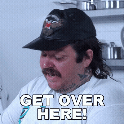 Man With Headphones Holding Plate Of Food GIF