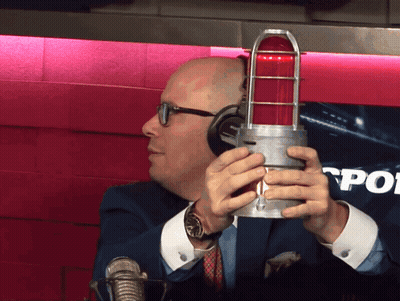Man With Headphones Holding Red Light GIF