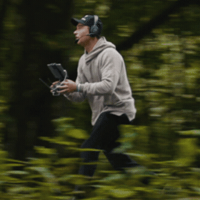 Man With Headphones Holding Remote Control GIF