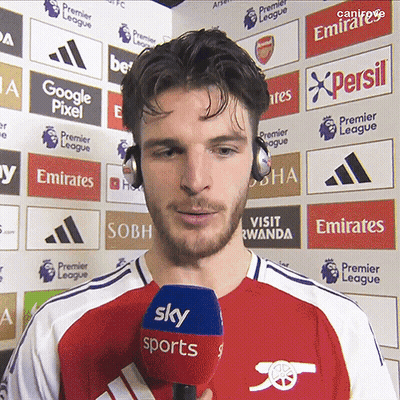 Man With Headphones Holding Sky Sports Microphone GIF