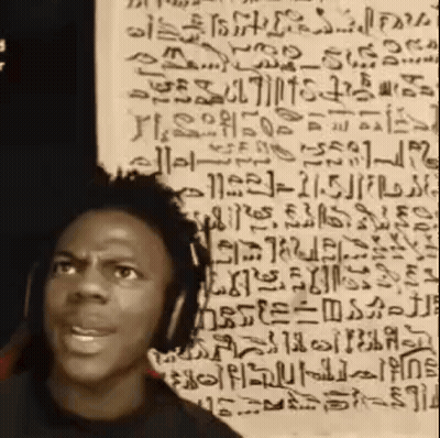 Man With Headphones In Front Of Arabic Writing GIF