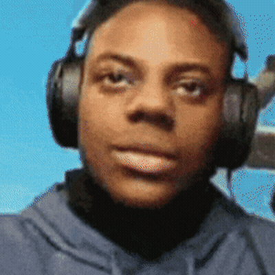 Man With Headphones Looking At Blue Sky GIF