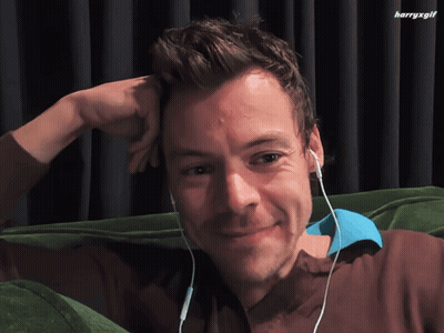 Man With Headphones Looking At Camera With Harryxgif