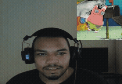 Man With Headphones Looking At Patrick Star GIF