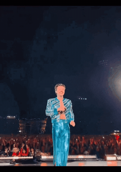 Man With Headphones Looks At Camera Harryxgif