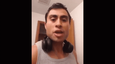 Man With Headphones Making Funny Face GIF