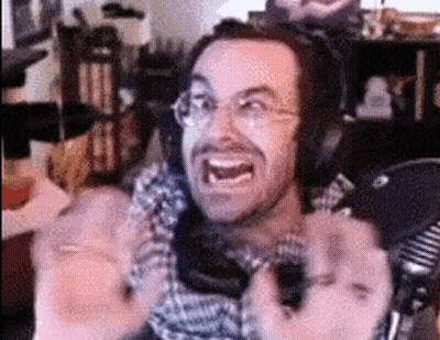 Man With Headphones Making Funny Face At Mic GIF