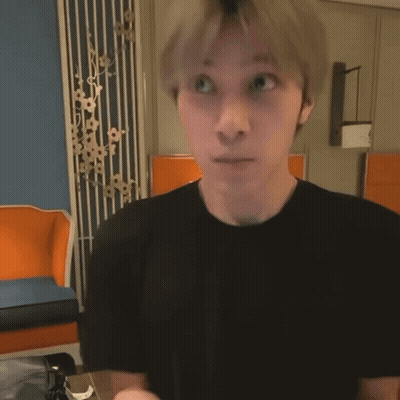 Man With Headphones Making Funny Face Playing Video Game GIF