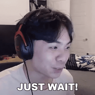 Man With Headphones Making Funny Face Saying Just Wait GIF