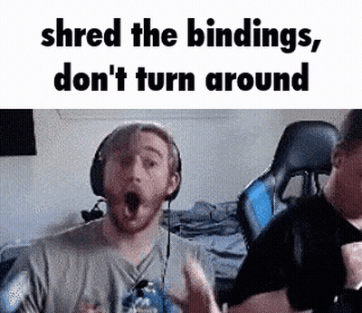 Man With Headphones Making Funny Face To Another Man GIF