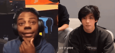 Man With Headphones Next To Man In Black Shirt Saying Tommy GIF