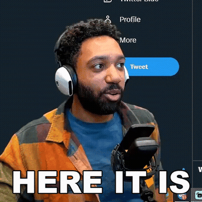 Man With Headphones Phone Says Here It Is GIF