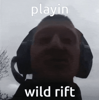 Man With Headphones Playin Wild Rift GIF