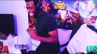 Man With Headphones Playing Fortnite Royale GIF