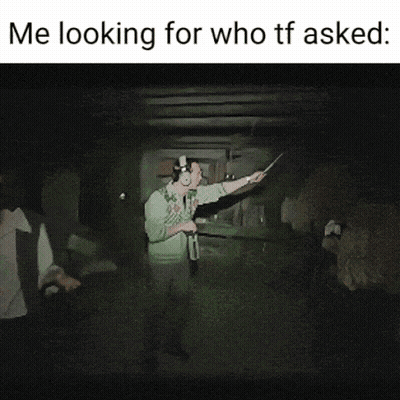 Man With Headphones Pointing In Dark Room Saying Me Looking For Who TF Asked GIF