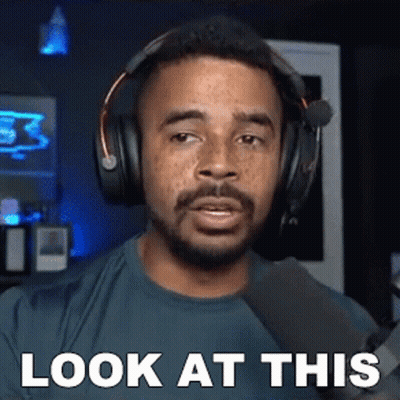 Man With Headphones Saying Look At This GIF