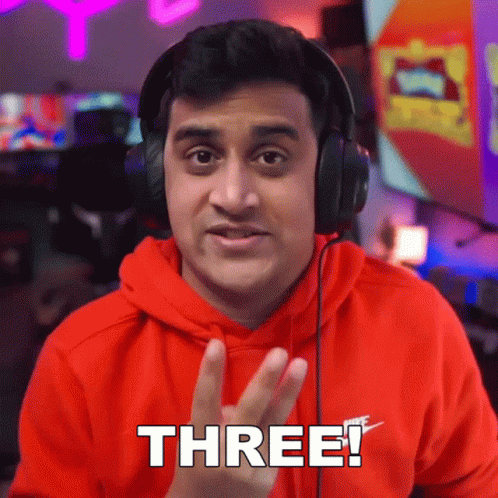 Man With Headphones Saying Three GIF